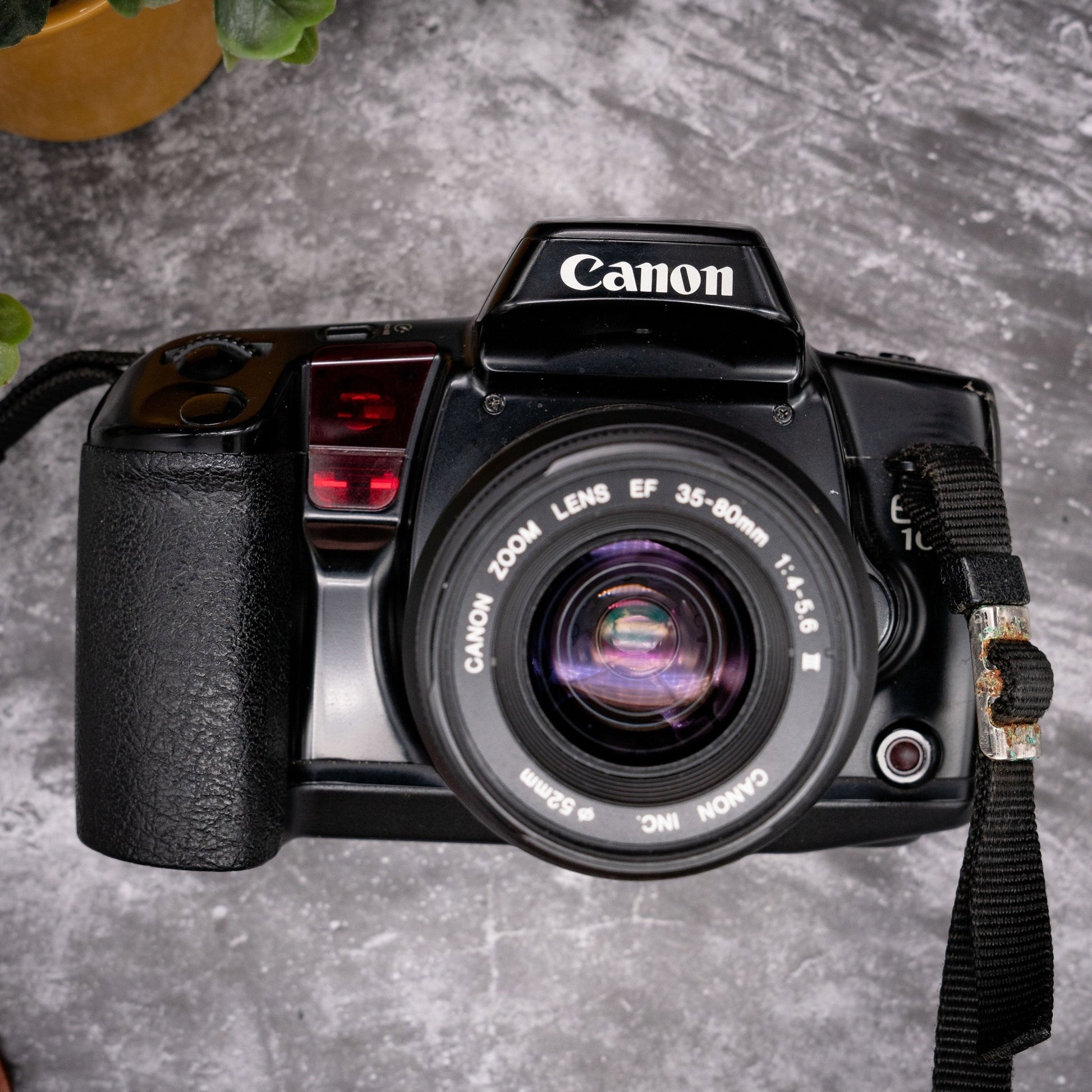 35mm Film Camera Kit | Canon EOS 10QD + 35-80mm Lens, Roll Of Expired Film, Strap - Expired Film Club